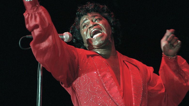 James Brown performing in red outfit