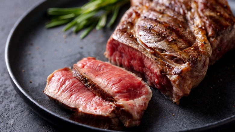 Sliced medium rare steak.