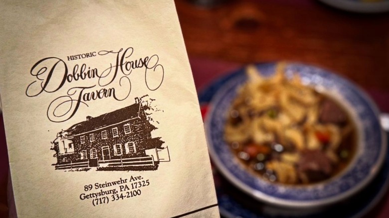 Napkin from the Dobbin House Tavern with meal in background