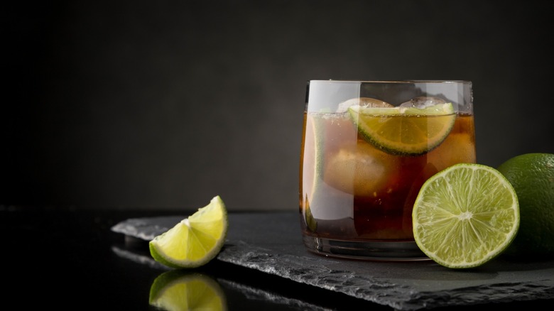 rum cocktail with lime in a glass