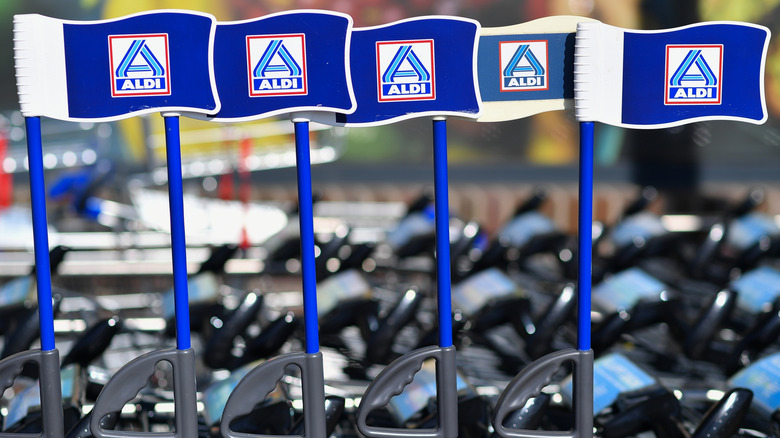 Aldi shopping carts with branded flags