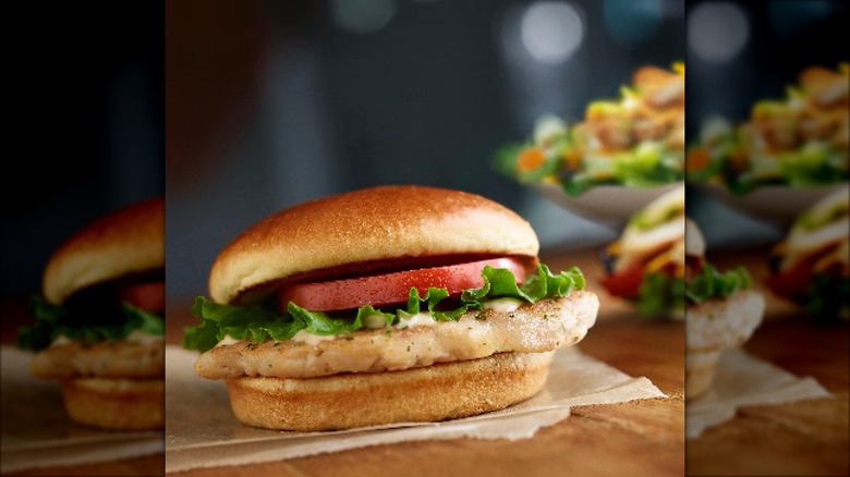 mcdonald's artisan grilled chicken sandwich against black background