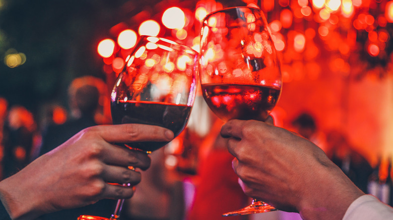 People toasting glasses of wine