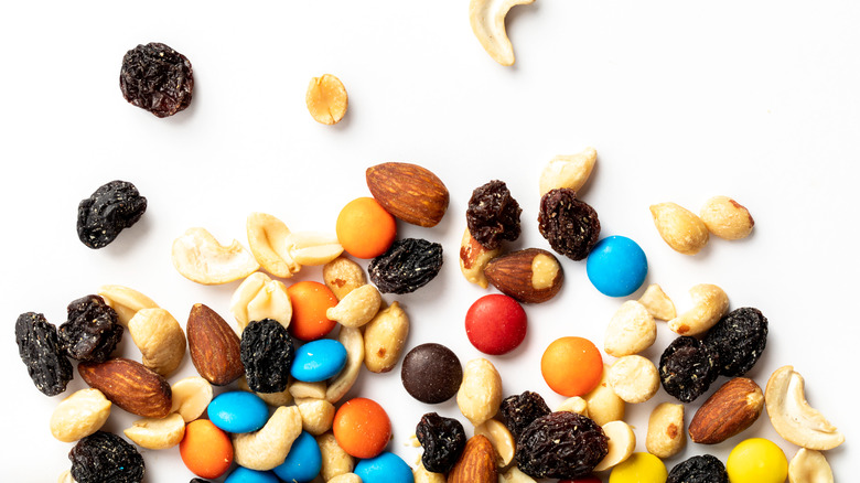 trail mix including peanuts, raisins, and m&ms