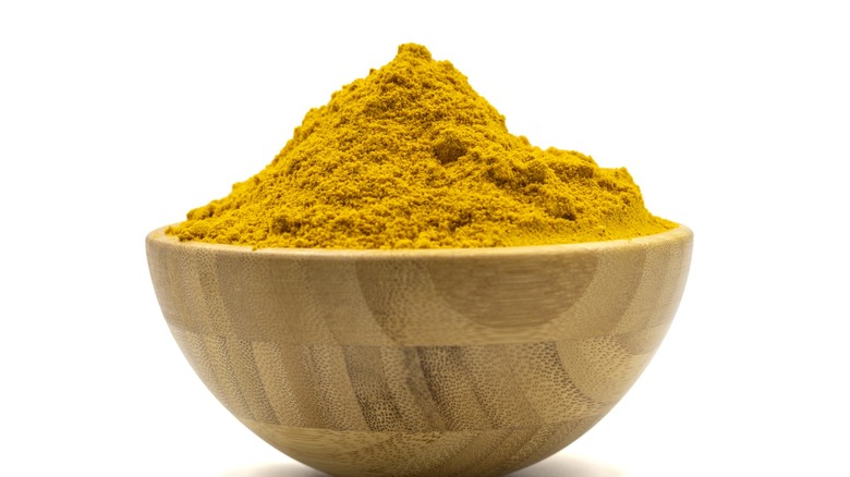 bowl of turmeric powder
