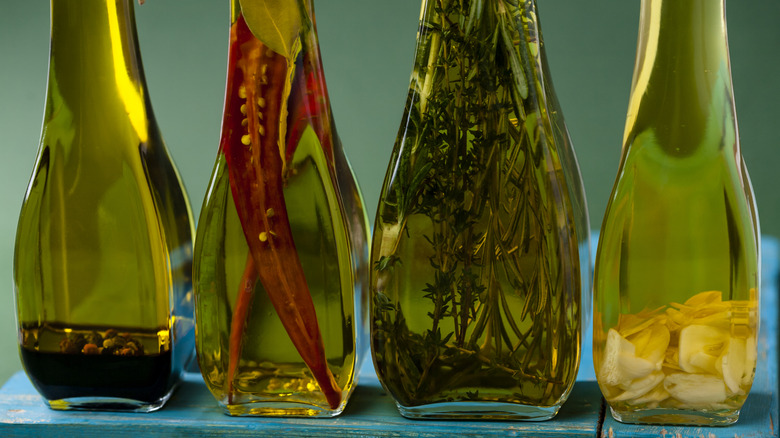 Four bottles of infused oil