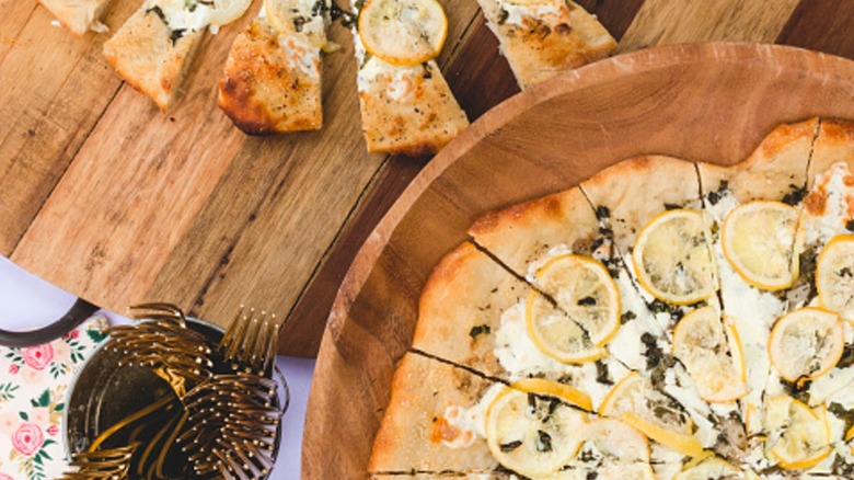 lemon on sliced pizza