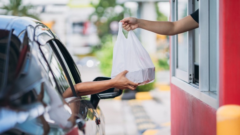 a customer received fast food at a drive-thru window