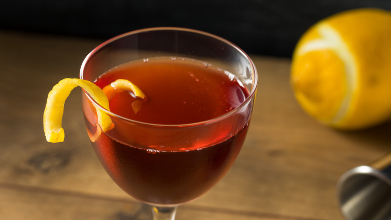 dubonnet and gin cocktail with lemon