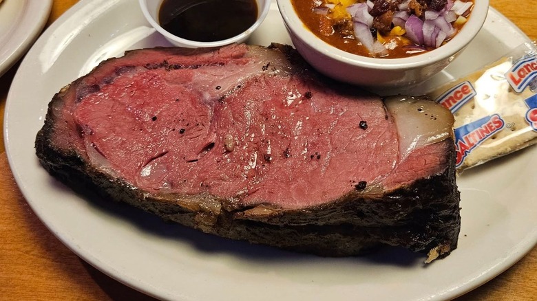 Closeup of Texas Roadhouse prime rib on white plate