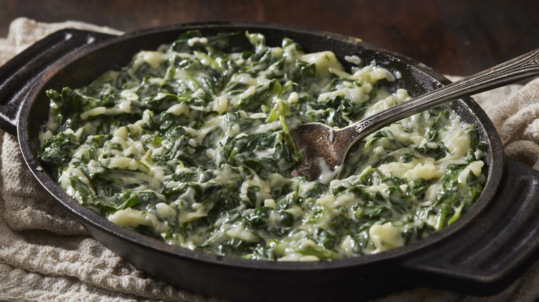 A skillet of creamed spinach