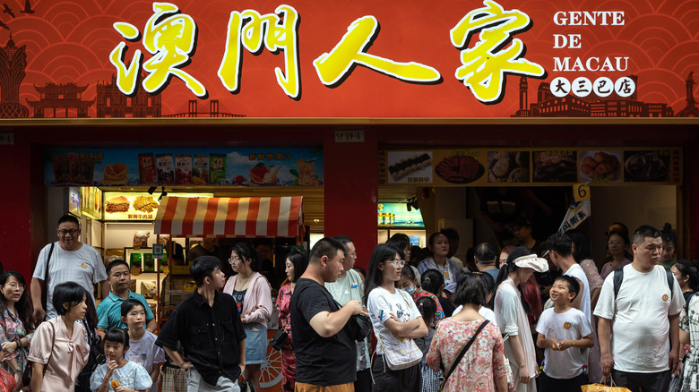 Patrons outside of an eatery in Macau