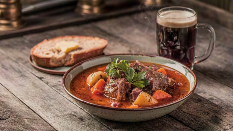 homey dish of stew with bread and beer