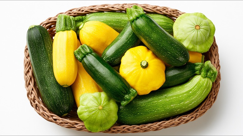 woven basket with abundant summer squash