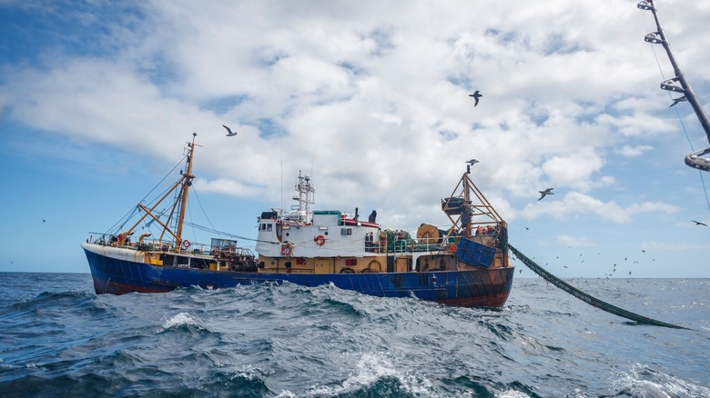 fishing boat with choppy waters