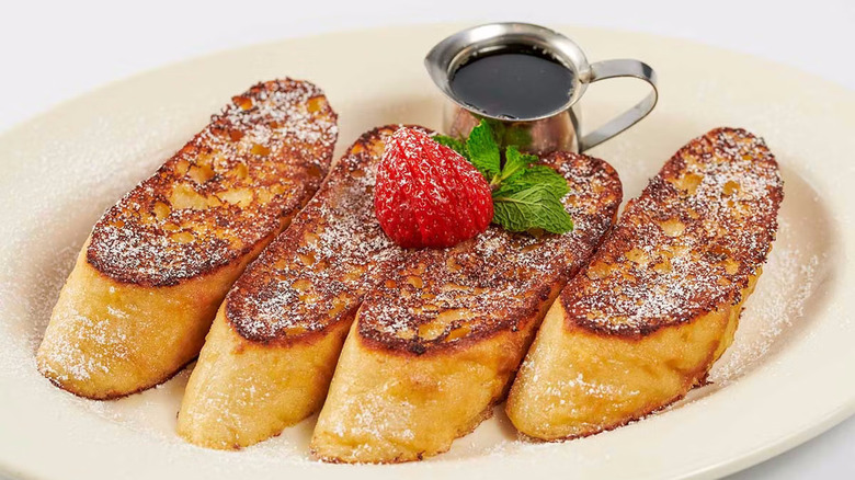 Four slices of French toast on plate