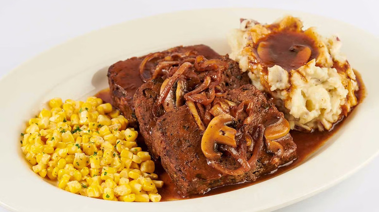 Platter of meatloaf with mashed potatoes and corn