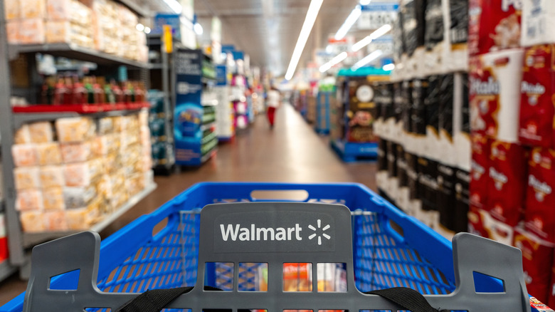 Walmart cart (first-person view) moving down an aisle
