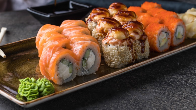 Wasabi paste and sushi rolls