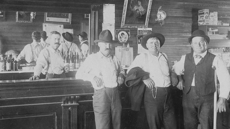 People inside a 19th century saloon