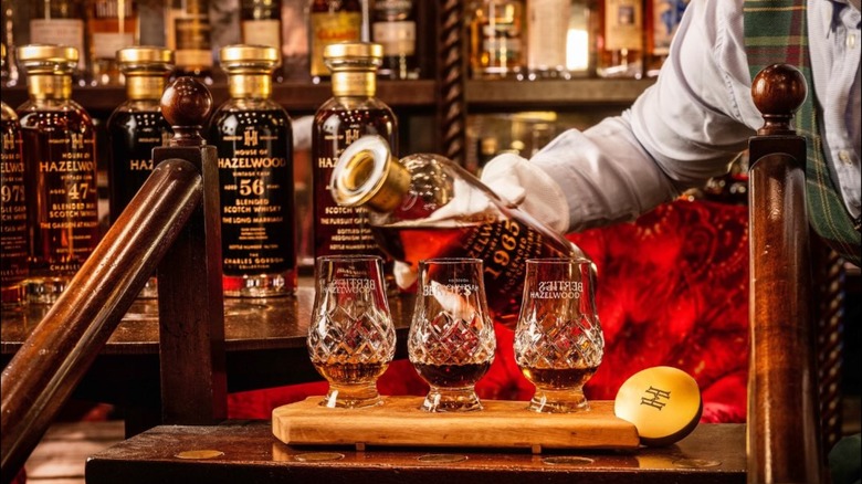 A flight of rare whiskies being served at The Fife Arms