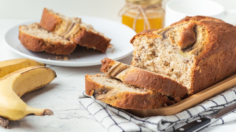 banana nut bread sliced on board