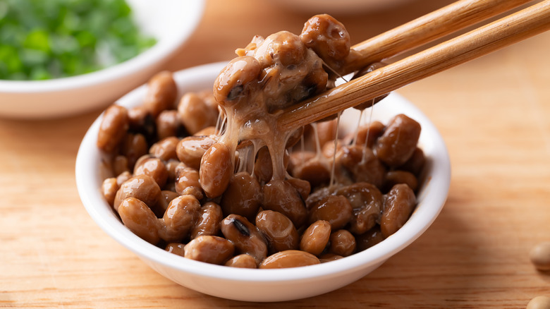 Close-up of a bowl of natto and chopsticks