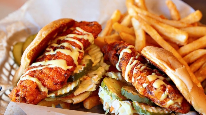 A close up of two chicken tender sandwiches from Hot Chicken Alley