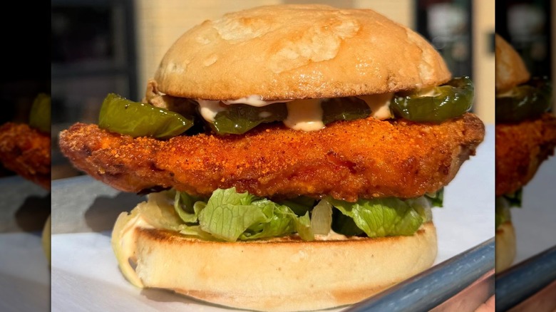A close-up of a fried chicken sandwich from Brew Bird