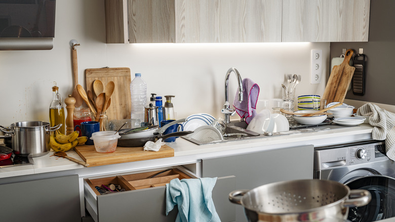 Cluttered, messy kitchen.