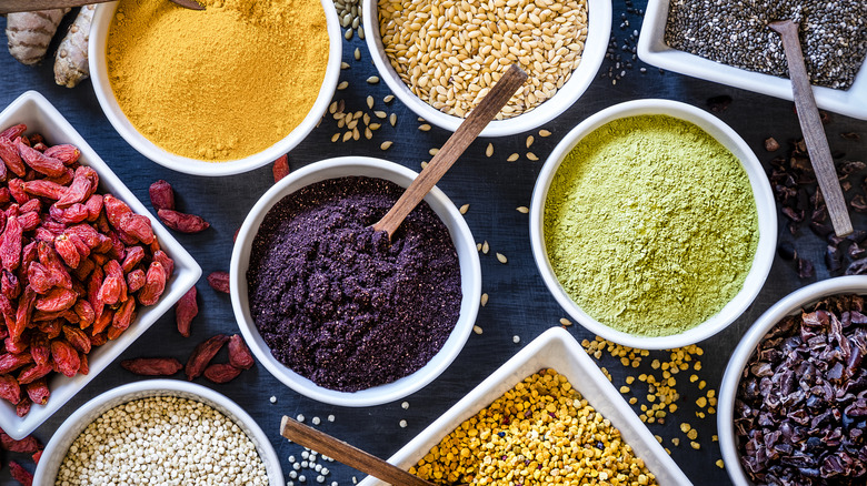 Overhead shot of small bowls of various superfoods