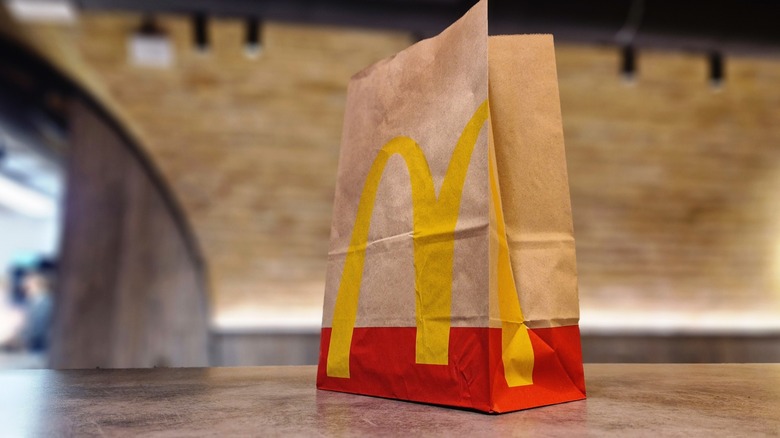 mcdonald's bag on a flat surface