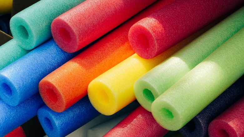 variety of colorful pool noodles
