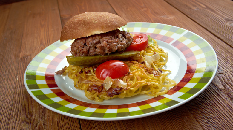 fall river style chow mein sandwich with beef, noodles, and burger bun