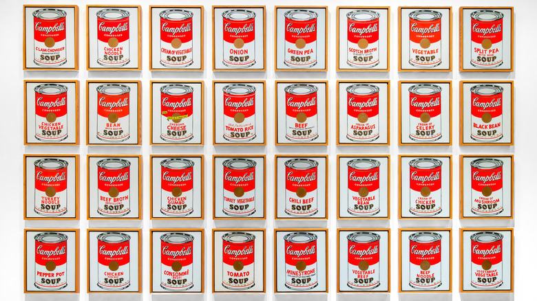 Collection of Andy Warhol Cambell's soup paintings on white background