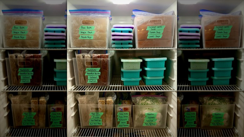 freezer organized with plastic bins
