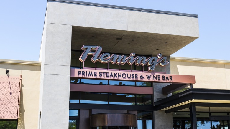 exterior of fleming's steakhouse with sign