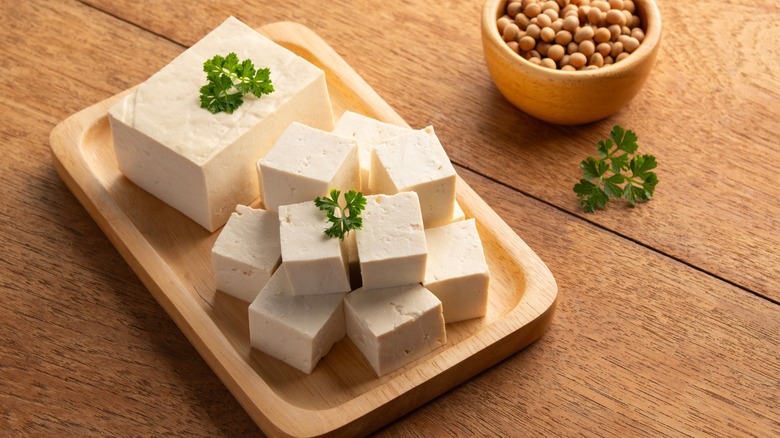 cubed tofu alongside soybeans in bowl