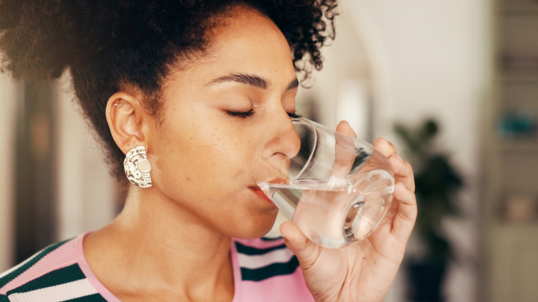 Woman drinking a glass of water