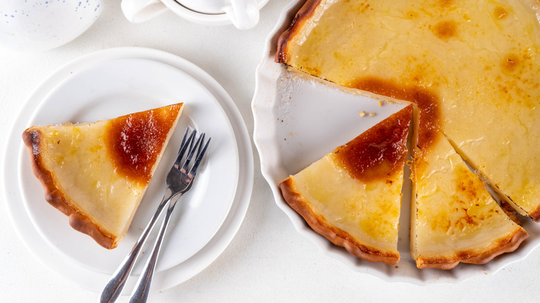 a water pie with one slice cut out and fork