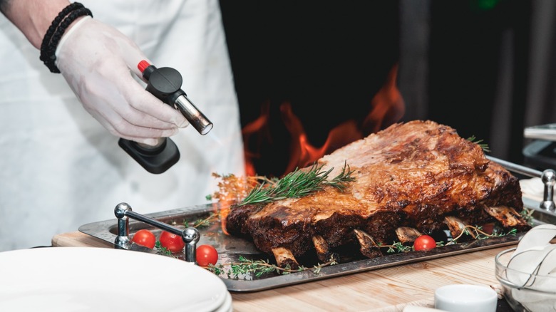 using blowtorch on prime rib
