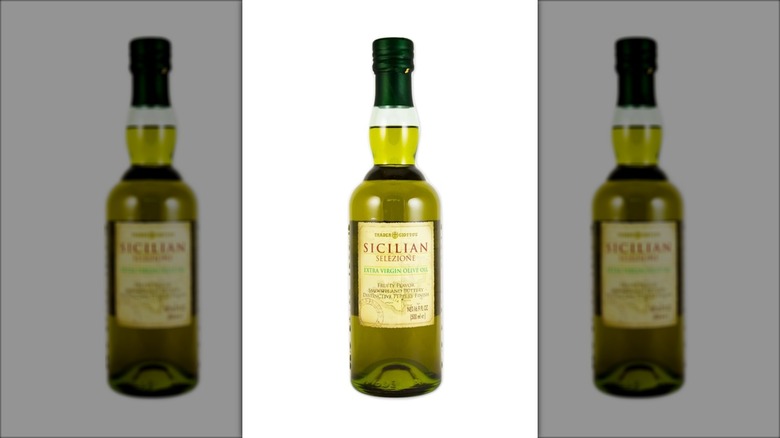 italian olive oil in clear bottle with black lid