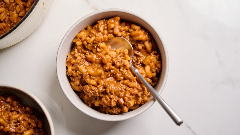 baked bean chili mac in a bowl on a table