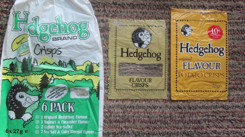 Three empty bags of Hedgehog flavour crisps