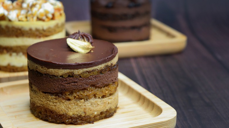 Mini cakes on wooden trays
