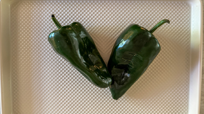 poblanos on baking sheet