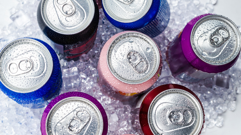 Soda cans on ice