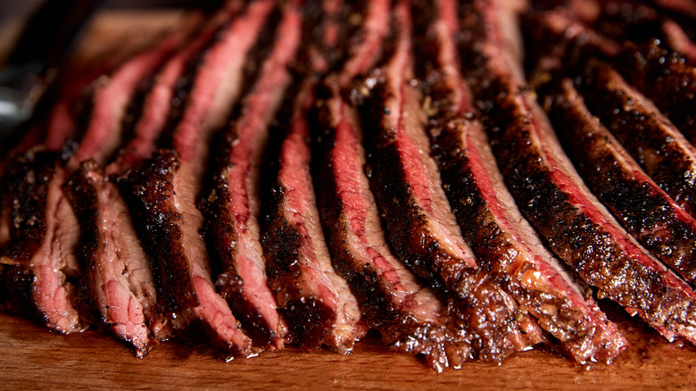 slices of brisket arrange on cutting board