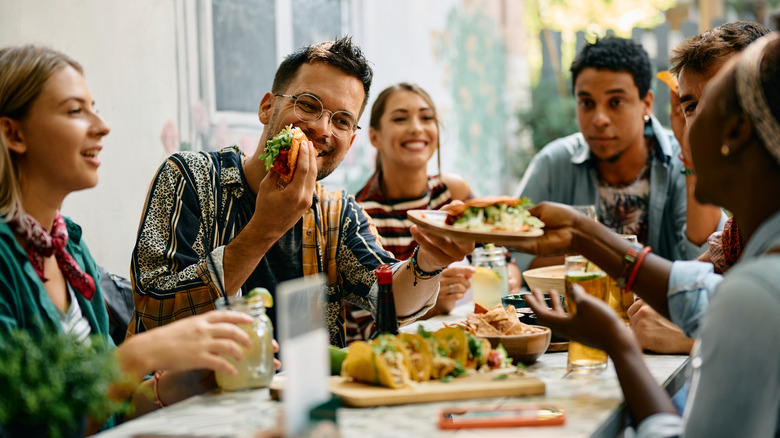 Group of people enjoying a meal