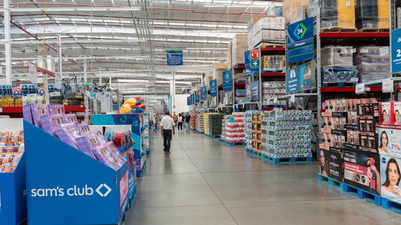 sam's club interior with signage and aisles